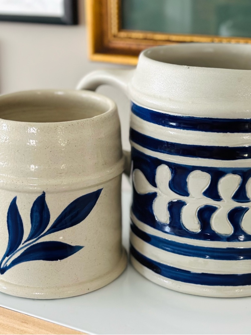 Pair of vintage replica Colonial salt glazed tavern mugs